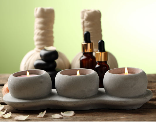 Concrete home decor, three tealights made of concrete on a table