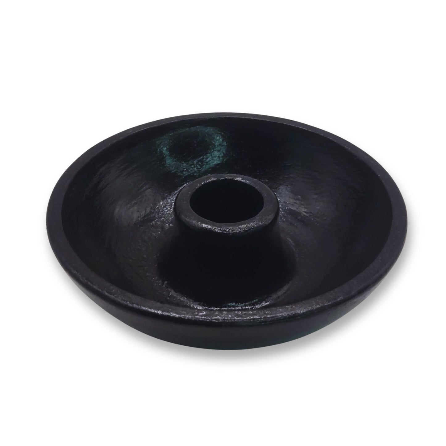Black round item on a white background