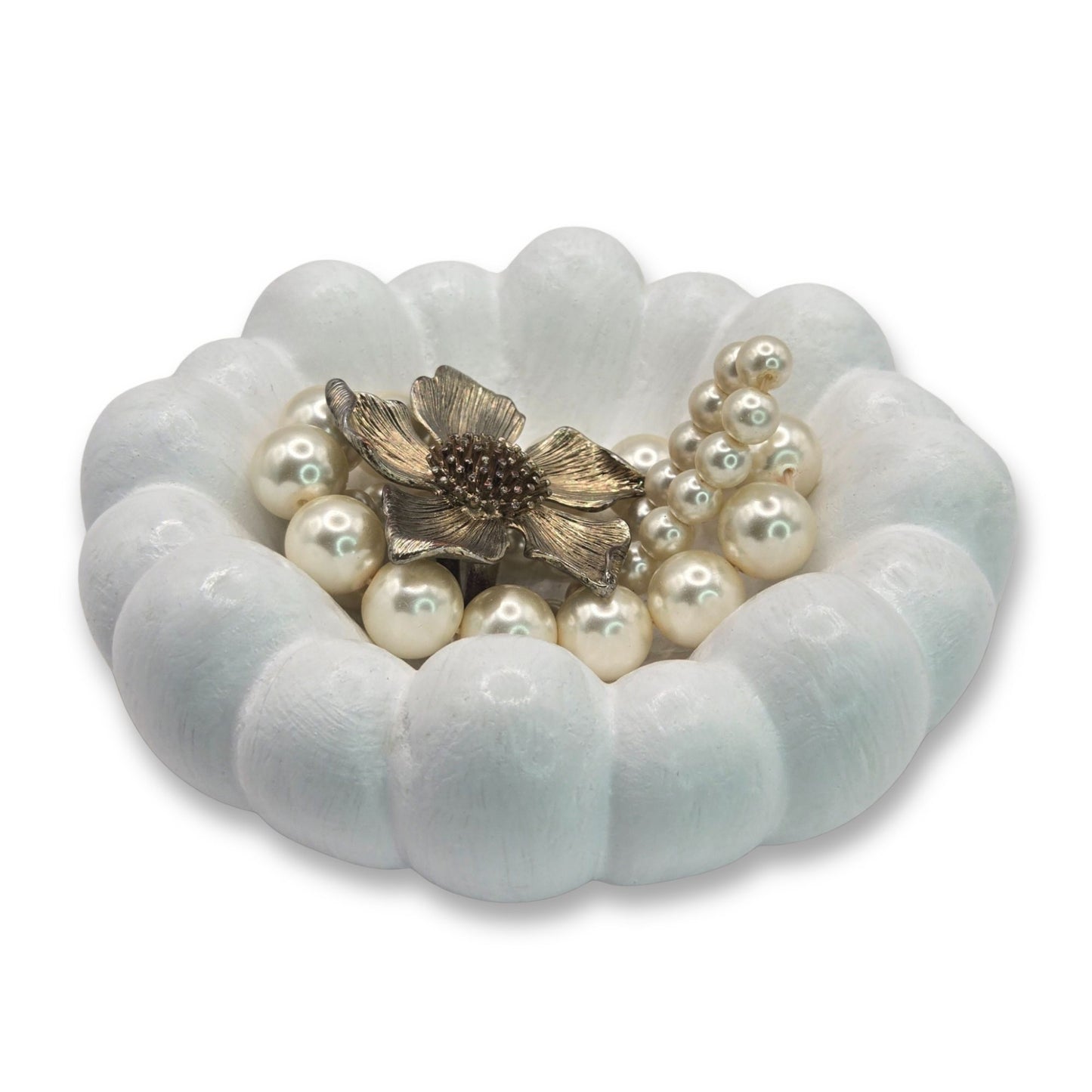 White Cloud Jewellery Bowl with a gold flower clasp on a white background