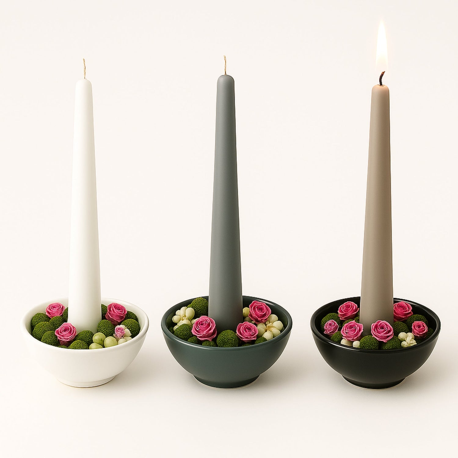 Wholesale Candlestick Holders three of them with flowers on a plain background