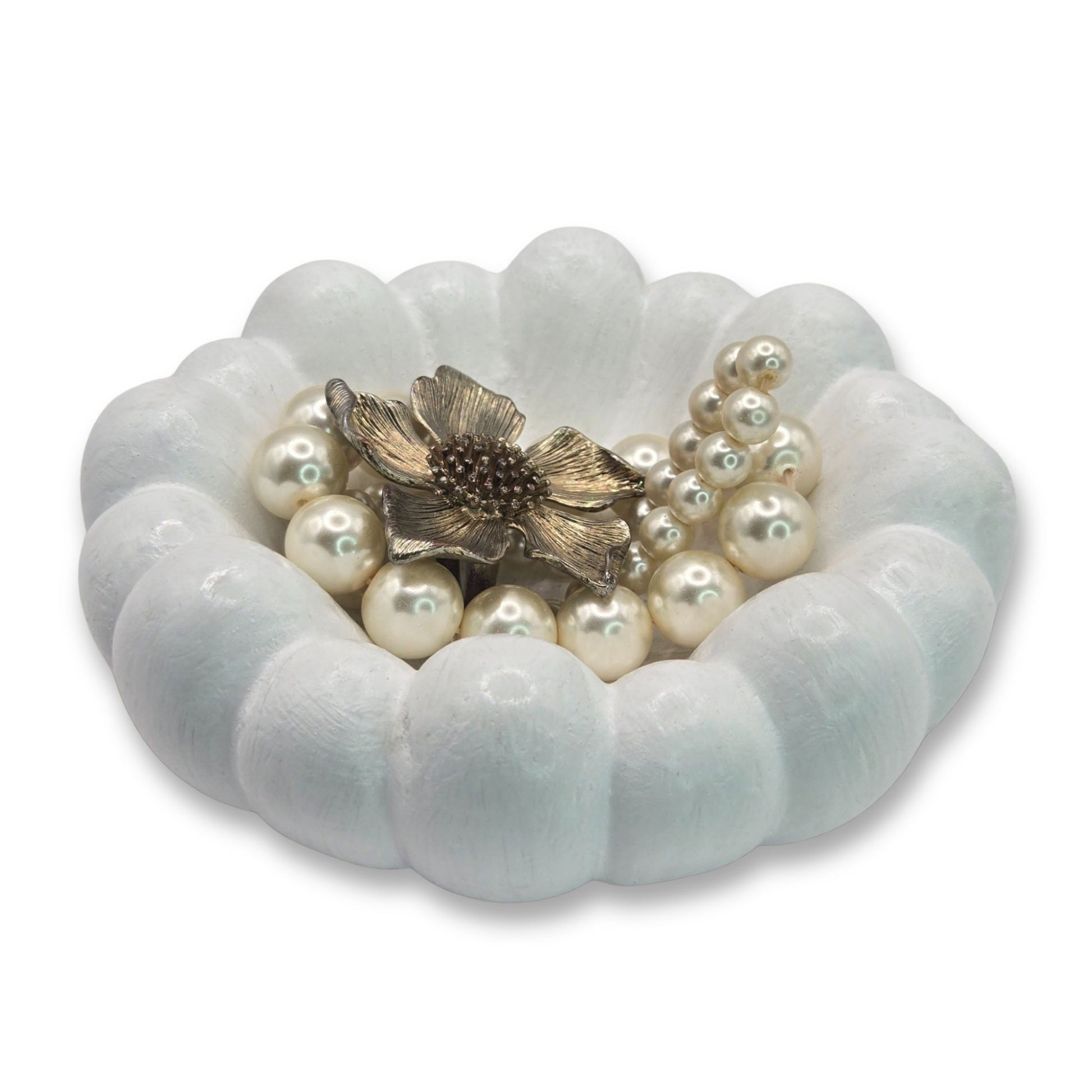 White Cloud Jewellery Bowl with a gold flower clasp on a white background