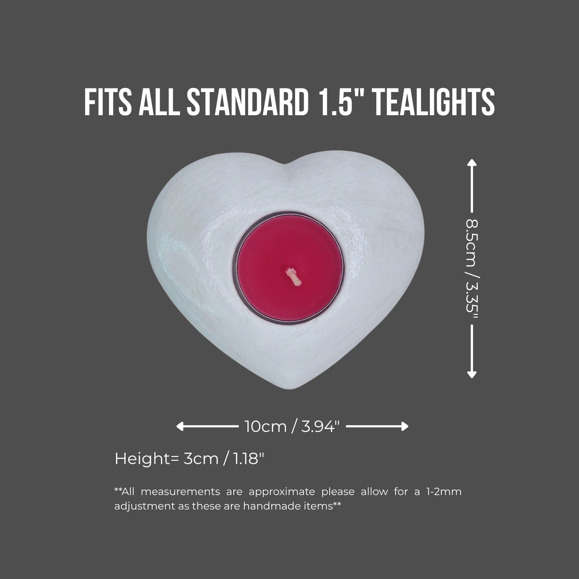 Heart-shaped candle holder with a red tealight on a gray background, showing measurements.