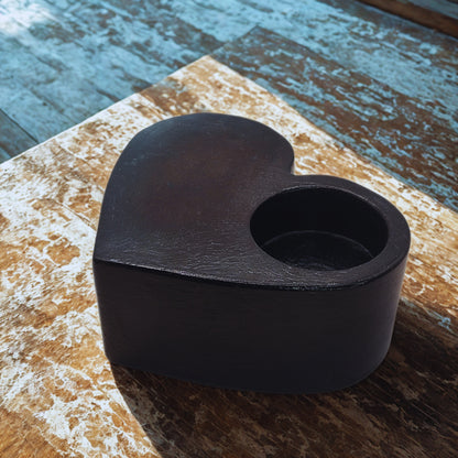Black Large Heart tealight holder on a wooden surface