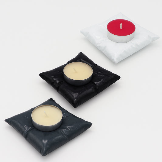 pillow tealight holder with candles on a white background