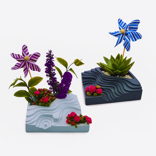 Three decorative planters with flowers and pinwheels on a white background